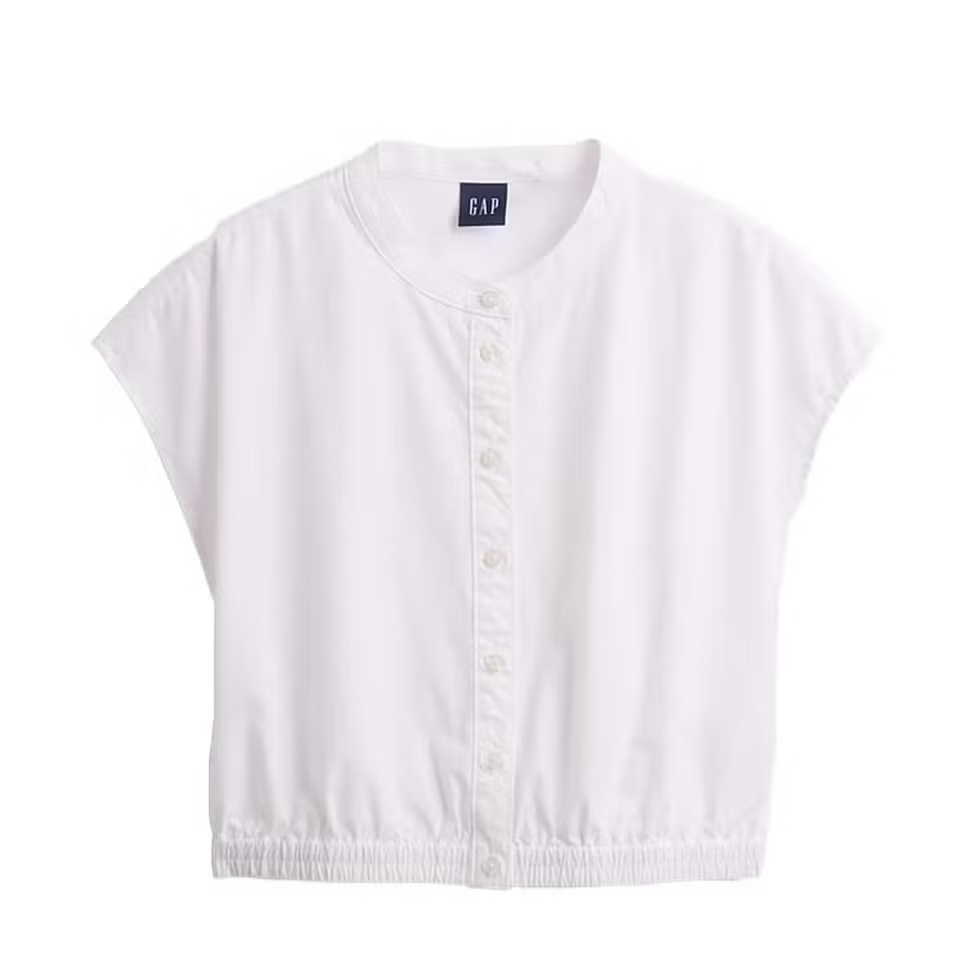 Dari Kiri ke Kanan: Gap Poplin Cap-Sleeve Shirt, Miu Miu Pleated Midi-Skirt, Margaux Lotto 35 Sandal