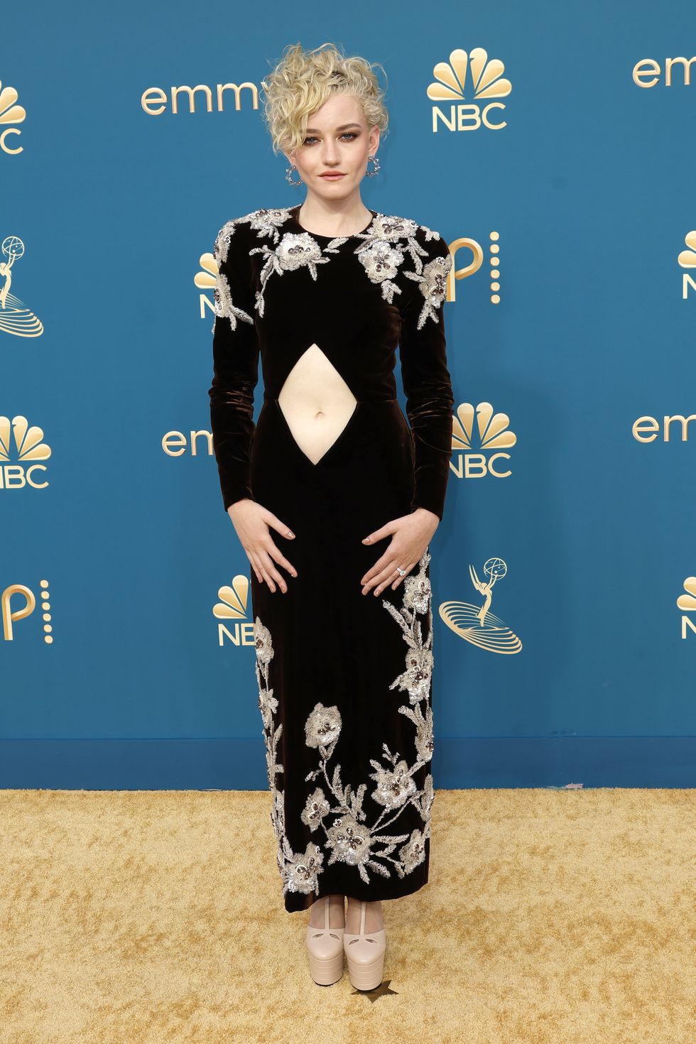 Julia Garner in Gucci and Swarovski earrings.