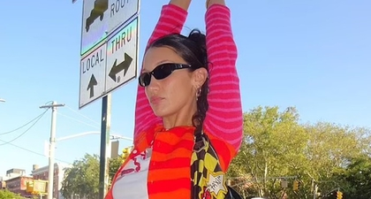 Bella Hadid Pasangkan Kardigan Neon dengan Tas Betsey Johnson Saat Berbelanja di NYC