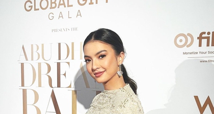 Penampilan Memukau Raline Shah dalam Balutan Gaun Cape Panjang Sapto Djojokartiko