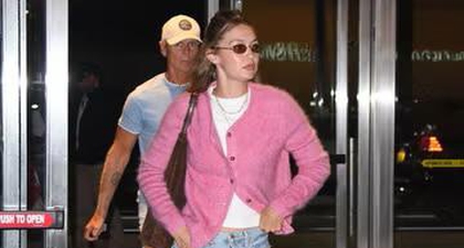 Gigi Hadid Terlihat Nyaman dengan Cardigan Kashmiri saat Berada di Bandara&nbsp;