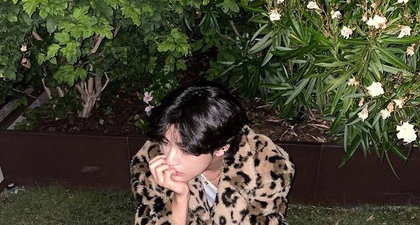 V BTS Bagikan Foto Throwback di Paris dengan Mengenakan Mantel Animal Print