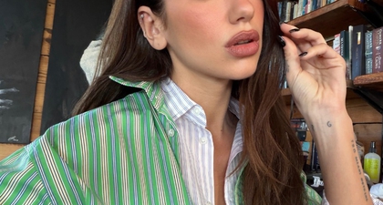 Dua Lipa Kenakan Jaket Militer Merah & Aksen Belt yang Ikonik di Cape Town