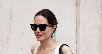 Angelina Jolie Menelusuri Jalan di Roma Lewat Ansambel Putih yang Menyejukkan